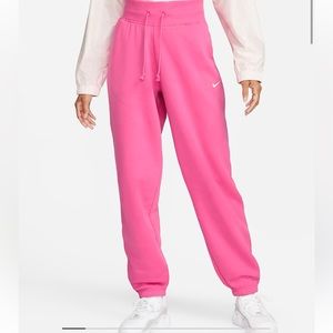 Pink oversized Nike sweats pink